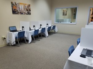 computer stations with chairs